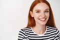 Portrait of beautiful redhead girl smiling looking at camera Royalty Free Stock Photo