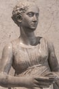 Portrait of beautiful Roman woman realized in stone, Rome, Italy