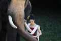 Portrait of Beautiful rural thai woman wear thai dress with elephant in Chiang Mai Royalty Free Stock Photo