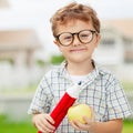 Portrait of Beautiful school boy looking very happy outdoors at Royalty Free Stock Photo