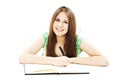 Portrait of a beautiful school girl at her desk