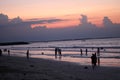 Portrait Beautiful sea beach sunrise sunset colorful sky view people walking Royalty Free Stock Photo