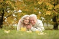 Portrait of senior couple lying on grass Royalty Free Stock Photo