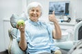 Portrait of a senior woman at the dental office