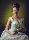 Portrait of a beautiful sensual girl with a big bust, flowers in Royalty Free Stock Photo