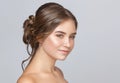 Portrait of a beautiful sensual light brown haired woman with a wedding hairstyle and nude make-up in a beauty salon.Wedding Royalty Free Stock Photo