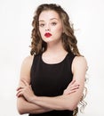 Portrait of a beautiful sensuality woman in black dress with long curly hair