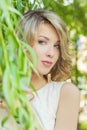 Portrait of a beautiful girl with large plump lips with white hair and a white full long finger Royalty Free Stock Photo