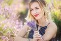 Portrait of beautiful girl lying on the lavender field Royalty Free Stock Photo