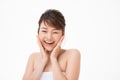 Portrait of Beautiful Skin care woman enjoy and happy, touching her face,isolated with clipping path