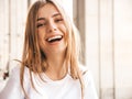 Beautiful trendy girl posing in the street Royalty Free Stock Photo