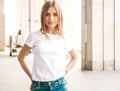 Beautiful smiling blond model dressed in summer hipster clothes Royalty Free Stock Photo