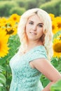 Portrait of a beautiful smiling blonde girl outdoors Royalty Free Stock Photo