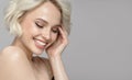 Portrait of a beautiful smiling blonde girl with a short haircut. Royalty Free Stock Photo