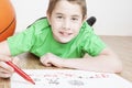 Portrait of beautiful smiling boy drawing Royalty Free Stock Photo