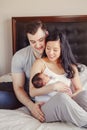 Chinese Asian mother and Caucasian father with mixed race newborn infant baby son daughter. Royalty Free Stock Photo