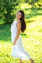 Portrait of beautiful smiling girl on nature