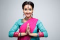 Portrait of beautiful smiling indian girl. Young indian woman model with traditional jewelry set Royalty Free Stock Photo