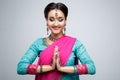 Portrait of beautiful smiling indian girl. Young indian woman model with traditional jewelry set Royalty Free Stock Photo