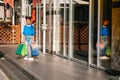 Portrait of beautiful smiling little girl wearing with shopping bag outdoors Royalty Free Stock Photo