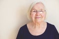 Close up portrait of an elderly woman in eyeglasses