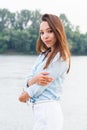 Portrait of beautiful smiling student girl on nature Royalty Free Stock Photo