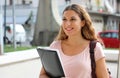 Portrait of beautiful smiling university female student goes back to school Royalty Free Stock Photo