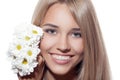 Portrait Of Beautiful Smiling Woman With Flowers. Clear Skin. Royalty Free Stock Photo