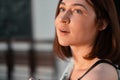 Portrait of Beautiful Smiling Woman Sculptor Artist in Modern WorkShop Studio. Face Illuminated With Sunlight