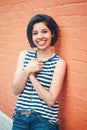 Portrait of beautiful smiling young hipster latin hispanic girl woman with short hair bob Royalty Free Stock Photo