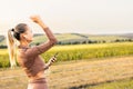 Portrait of beautiful smiling young woman enjoying yoga, relaxing, feeling alive, breathing fresh air, got freedom from Royalty Free Stock Photo