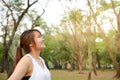 Portrait of beautiful smiling young woman enjoying yoga, relaxing, feeling alive, breathing fresh air, got freedom from work.