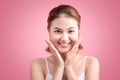 Portrait of a beautiful smiling young woman with natural make-up. Skincare, healthcare. Healthy teeth. Studio shot. Isolated on P Royalty Free Stock Photo