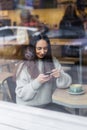 Portrait beautiful smiling young woman using mobile phone Royalty Free Stock Photo