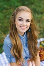 Portrait of a beautiful sweet young woman with long brown hair and a radiant dazzling smile Royalty Free Stock Photo