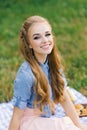 Portrait of a beautiful sweet young woman with long brown hair and a radiant dazzling smile Royalty Free Stock Photo