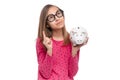 Teen girl with piggy bank Royalty Free Stock Photo