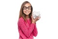 Teen girl with piggy bank Royalty Free Stock Photo