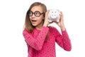 Teen girl with piggy bank Royalty Free Stock Photo