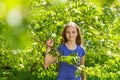 Portrait of beautiful teenager girl with pear tree Royalty Free Stock Photo