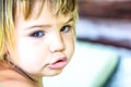 Portrait of a beautiful two year old girl with blonde hair Royalty Free Stock Photo