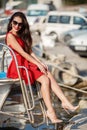 Portrait of a beautiful woman on the background of the sea and yachts Royalty Free Stock Photo