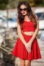 Portrait of a beautiful woman on the background of the sea and yachts Royalty Free Stock Photo