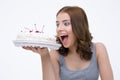 Portrait of a beautiful woman bitting cake