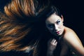 Portrait of a beautiful woman with a blowing hair Royalty Free Stock Photo