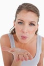 Portrait of a beautiful woman blowing a kiss Royalty Free Stock Photo