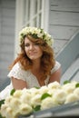 Portrait of a beautiful woman with a bouquet of white roses Royalty Free Stock Photo