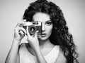 Portrait of beautiful woman with the camera. Girl photographer Royalty Free Stock Photo