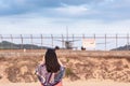 Portrait of Beautiful Woman is Capturing Photos The Airplane While Take off Landing on Runway Track. Tourist Woman Having Fun With