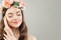 Portrait of beautiful woman with clear skin, long shiny hair and flowers Royalty Free Stock Photo